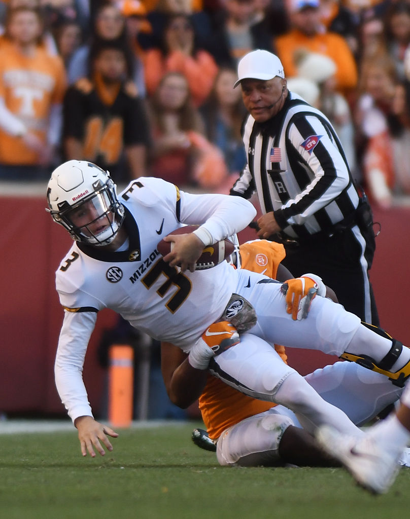 Missouri quarterback Drew Lock is tackled
